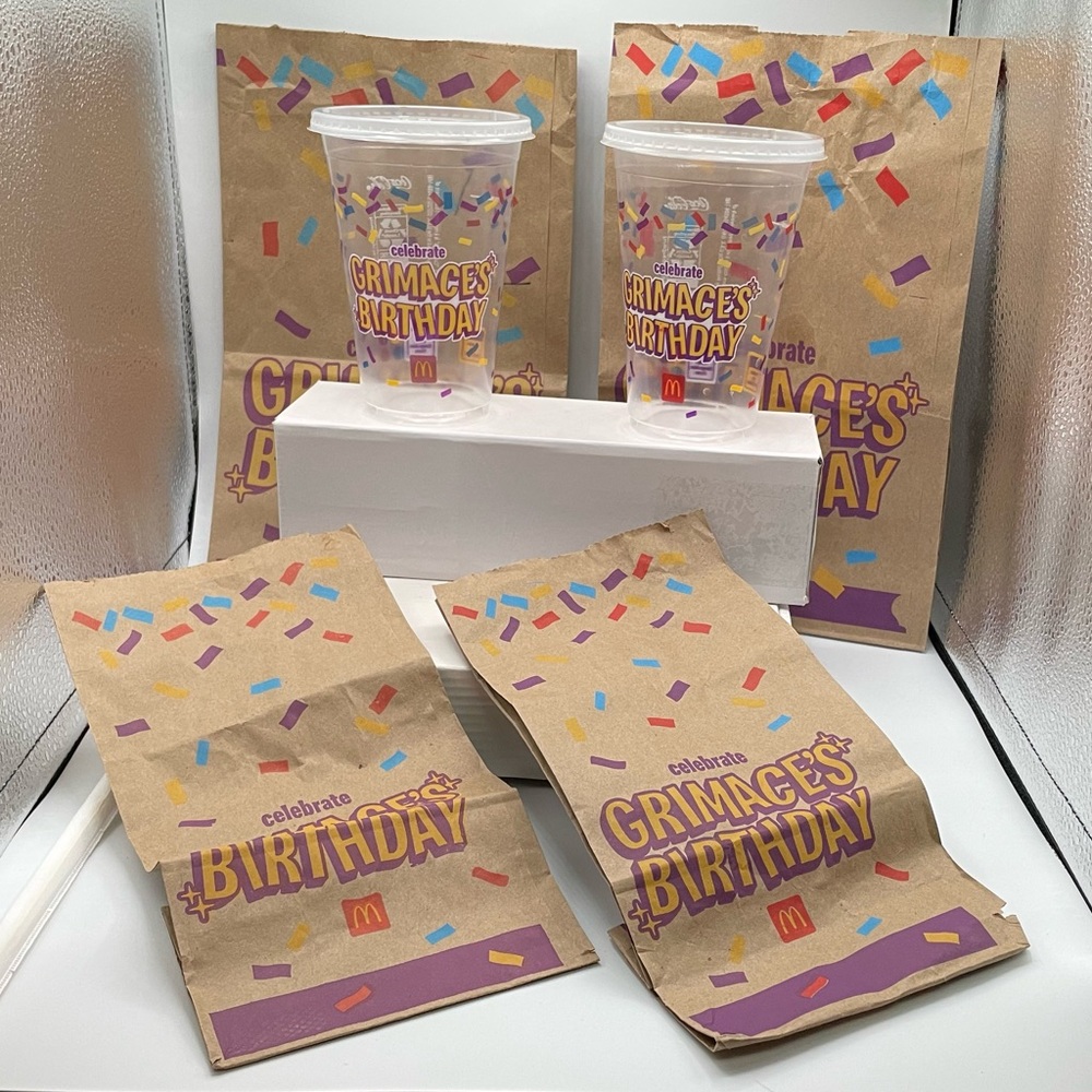 McDonald’s Grimace Birthday Packaging. 2 cups, 2 small bags, 2 large bags